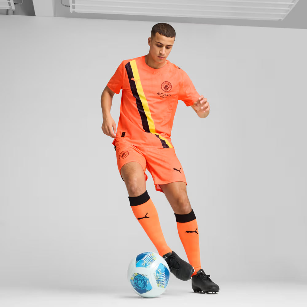 Camisa Manchester City x KidSuper 25/26 Torcedor Puma Masculina Laranja